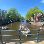 Joyjoyjoy The White Wilde Ecolicious In A Historic Canalhouse From 1799 With Terrace At The Canals Amsterdam